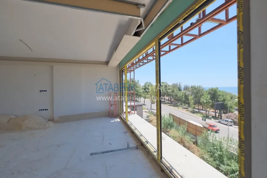 Photo -  Residential complex under construction on the beachfront in Antalya, Lara - Guzeloba district 5 