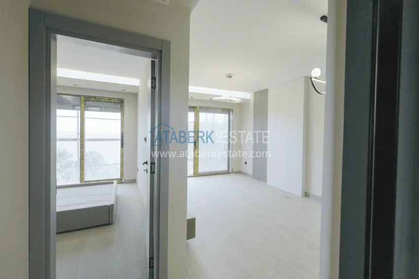 Photo -  Residential complex under construction on the beachfront in Antalya, Lara - Guzeloba district 6 