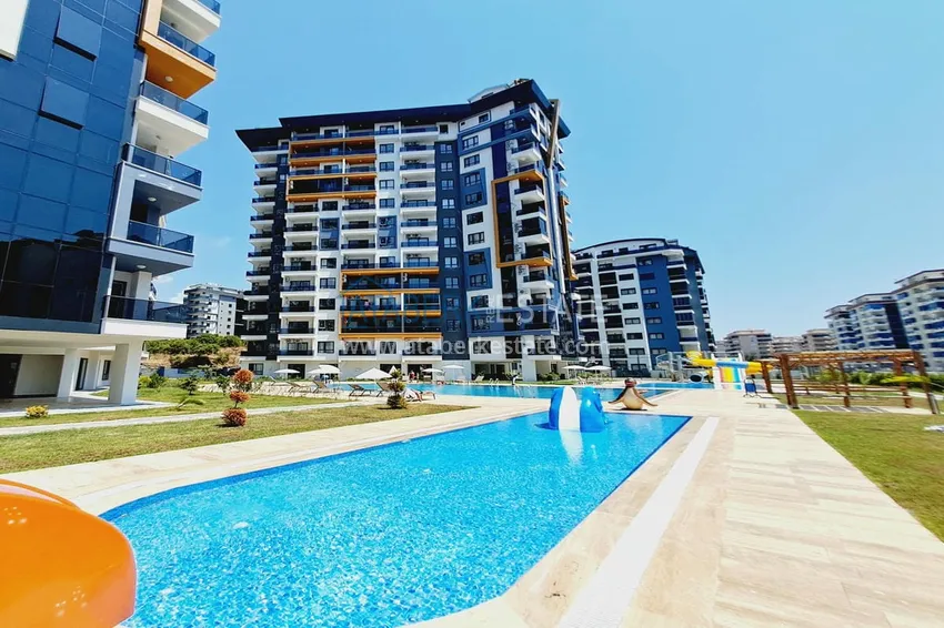 Apartment 1+1 with furniture and mountain views. New buildings in Alanya, district Mahmutlar 1 