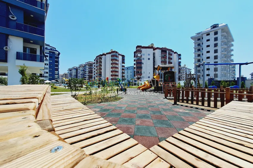 Apartment 1+1 with furniture and mountain views. New buildings in Alanya, district Mahmutlar 13 