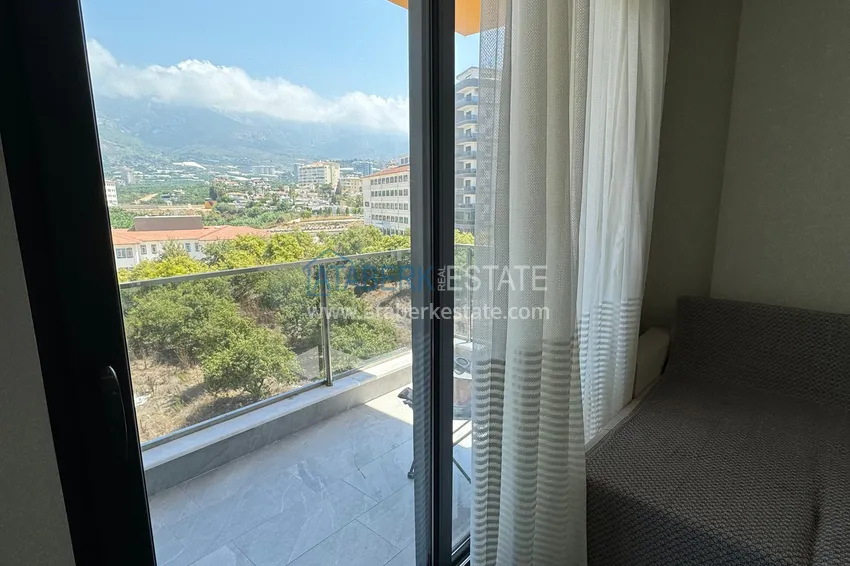 Purchase  1+1 apartment with new furniture mountain views in a modern complex - Mahmutlar district, Alanya 13 