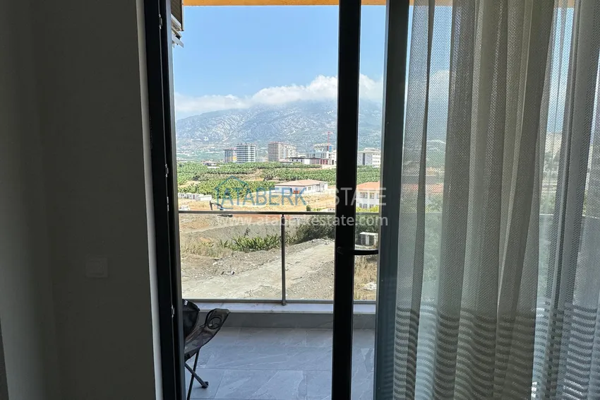 Purchase  1+1 apartment with new furniture mountain views in a modern complex - Mahmutlar district, Alanya 14 