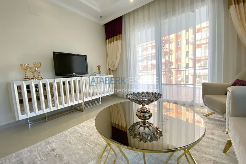 Purchase  A three-room apartment with new furniture in Tosmur, Alanya is an ideal choice for living and relaxing! 15 