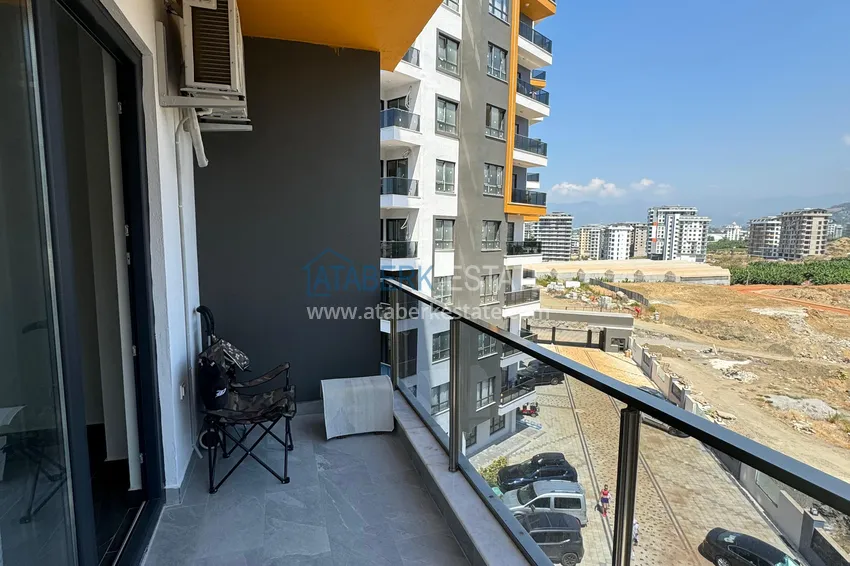 Purchase  1+1 apartment with new furniture mountain views in a modern complex - Mahmutlar district, Alanya 17 