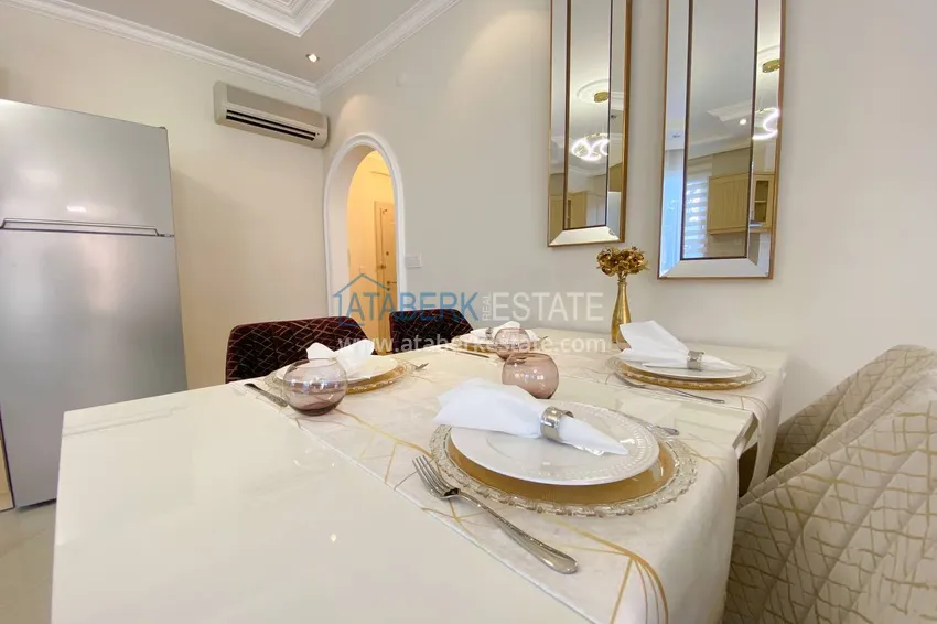 Purchase  A three-room apartment with new furniture in Tosmur, Alanya is an ideal choice for living and relaxing! 16 