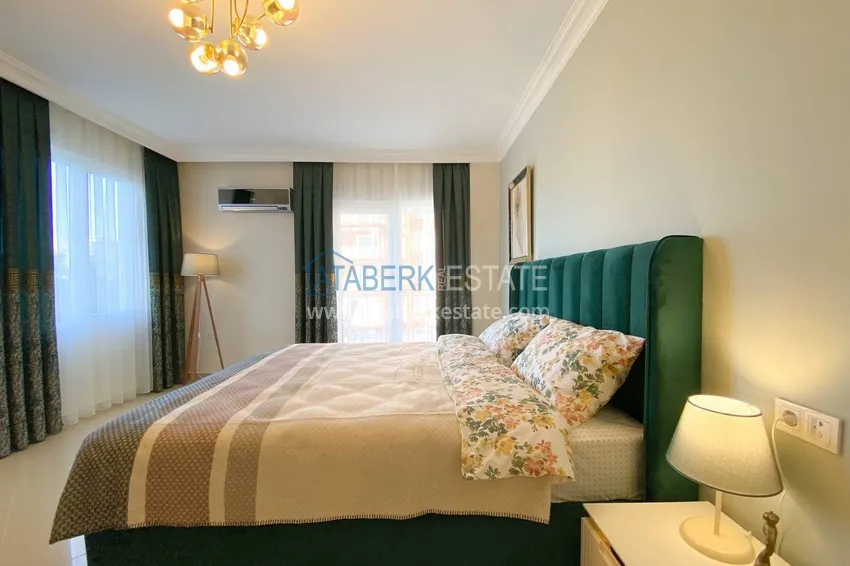 Purchase  A three-room apartment with new furniture in Tosmur, Alanya is an ideal choice for living and relaxing! 18 