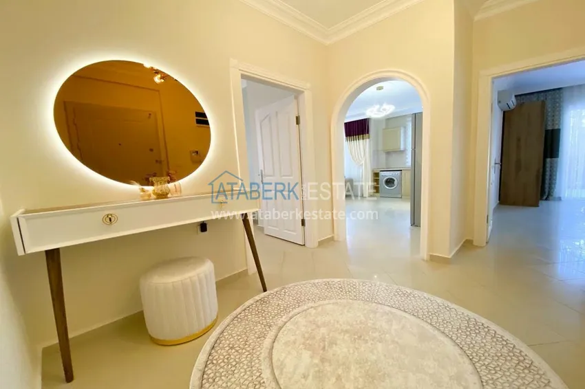 Purchase  A three-room apartment with new furniture in Tosmur, Alanya is an ideal choice for living and relaxing! 1 
