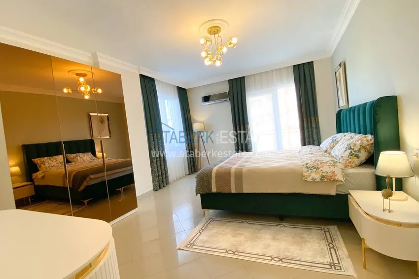 Purchase  A three-room apartment with new furniture in Tosmur, Alanya is an ideal choice for living and relaxing! 20 