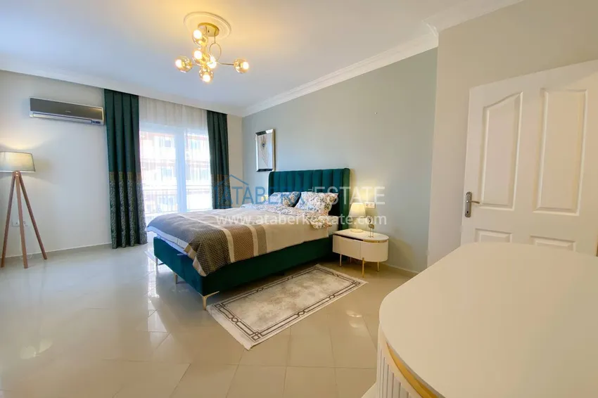 Purchase  A three-room apartment with new furniture in Tosmur, Alanya is an ideal choice for living and relaxing! 21 
