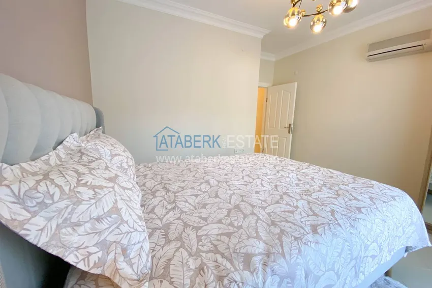 Purchase  A three-room apartment with new furniture in Tosmur, Alanya is an ideal choice for living and relaxing! 24 