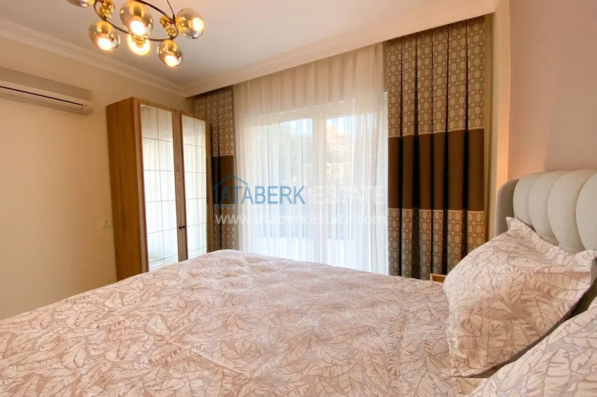 Purchase  A three-room apartment with new furniture in Tosmur, Alanya is an ideal choice for living and relaxing! 25 
