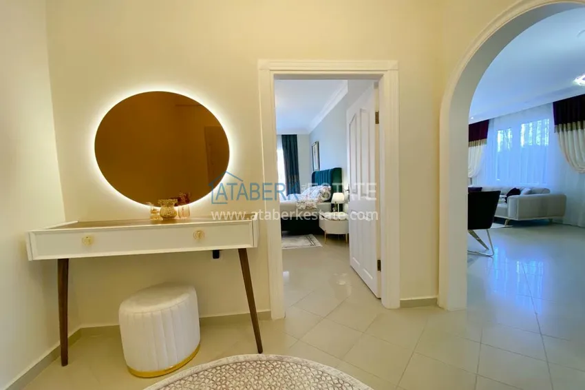 Purchase  A three-room apartment with new furniture in Tosmur, Alanya is an ideal choice for living and relaxing! 2 
