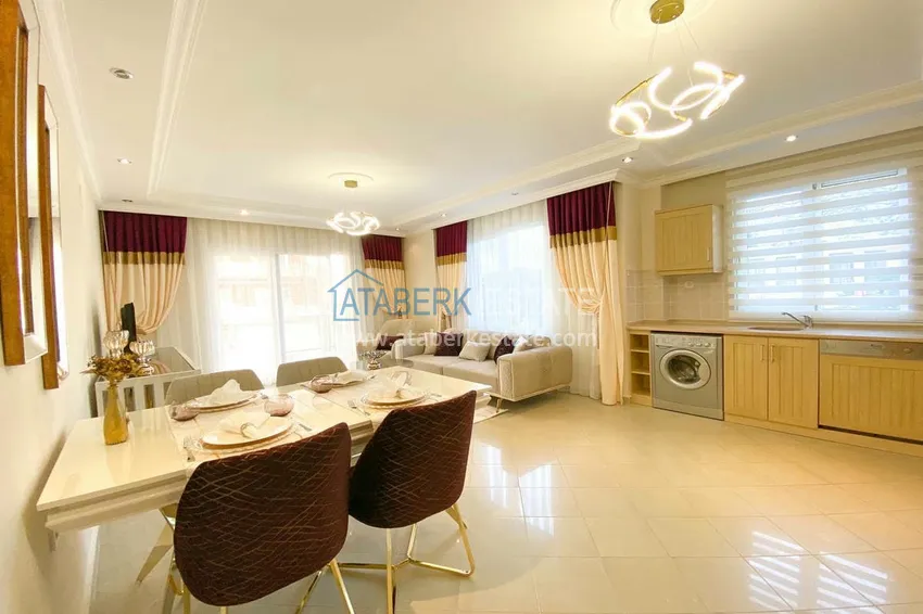 Purchase  A three-room apartment with new furniture in Tosmur, Alanya is an ideal choice for living and relaxing! 4 