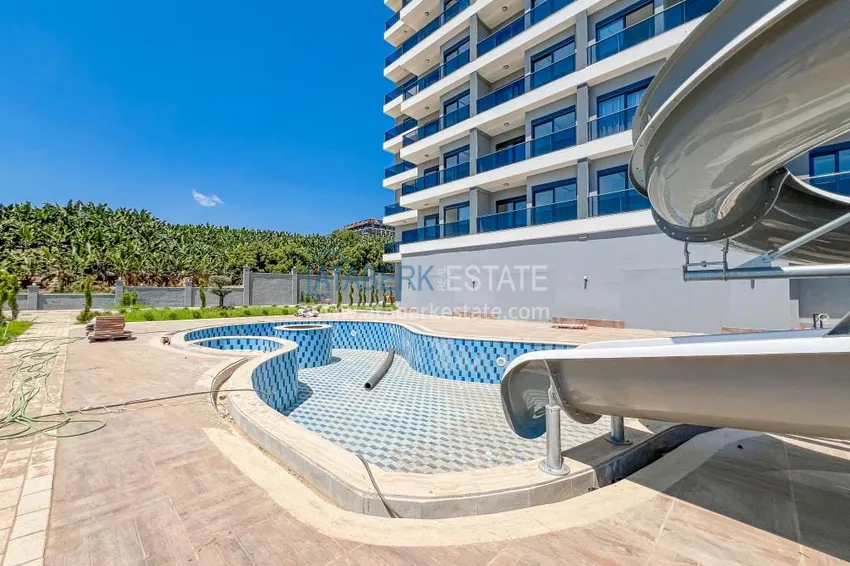 Finished one-bedroom apartment in a new complex - Mahmutlar district, Alanya 3 