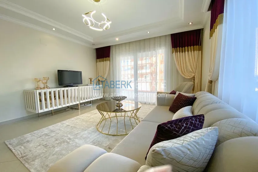 Purchase  A three-room apartment with new furniture in Tosmur, Alanya is an ideal choice for living and relaxing! 5 