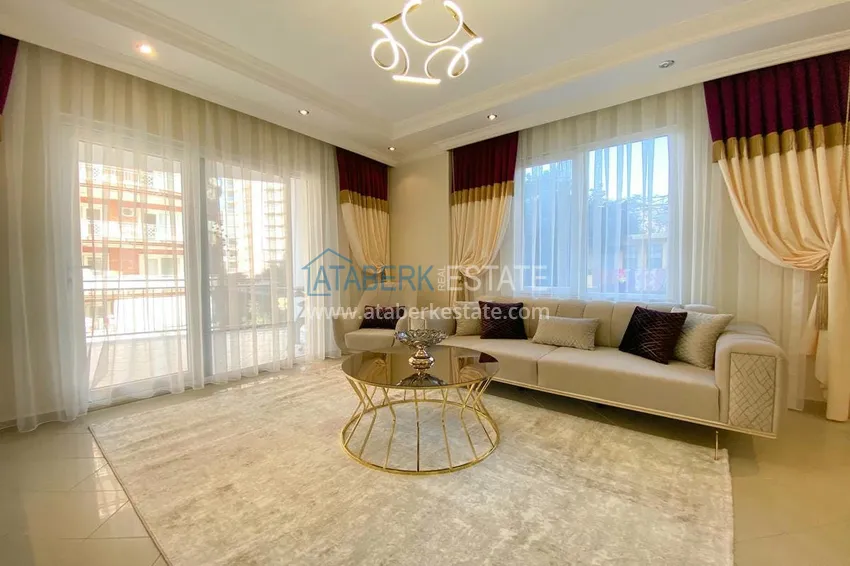 Purchase  A three-room apartment with new furniture in Tosmur, Alanya is an ideal choice for living and relaxing! 6 