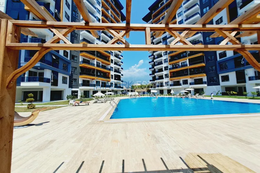 Apartment 1+1 with furniture and mountain views. New buildings in Alanya, district Mahmutlar 6 