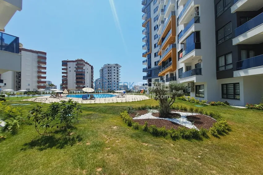 Apartment 1+1 with furniture and mountain views. New buildings in Alanya, district Mahmutlar 8 