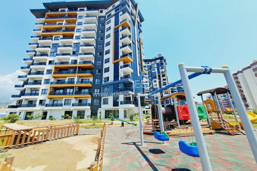 Apartment 1+1 with furniture and mountain views. New buildings in Alanya, district Mahmutlar 10 