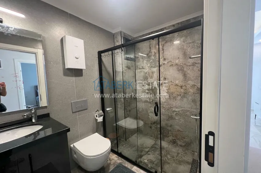 Purchase New buildings in Alanya! Furnished one-bedroom apartment in a modern residential complex in the center of Oba 9