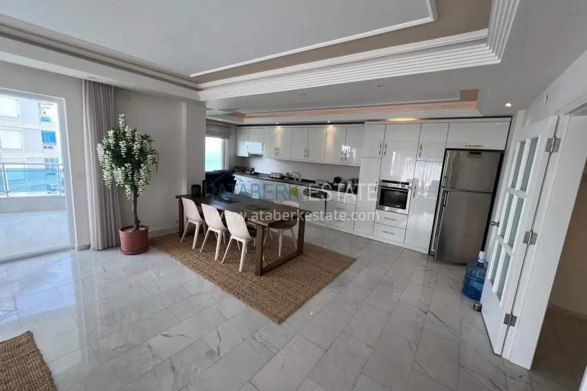 Purchase 3+1 linear apartment with furniture, sea and mountain views on the beachfront - Tosmur, Alanya 9