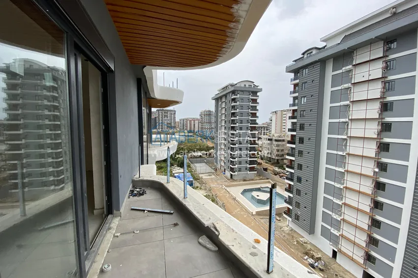 Purchase  Three-room apartment with sea view in a complex under construction - Mahmutlar district, Alanya 14 