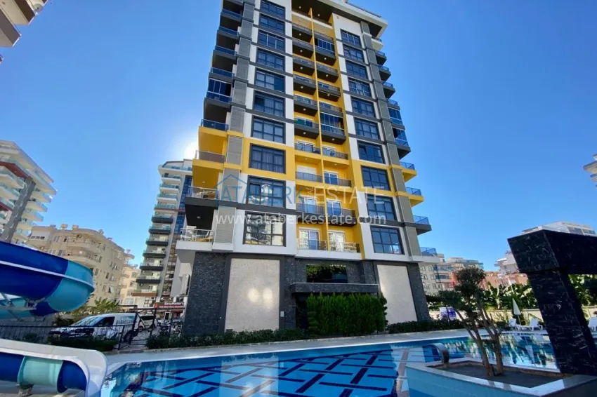 Linear 3+1 apartment with separate kitchen, new furniture and partial sea view - Mahmutlar district, Alanya 1