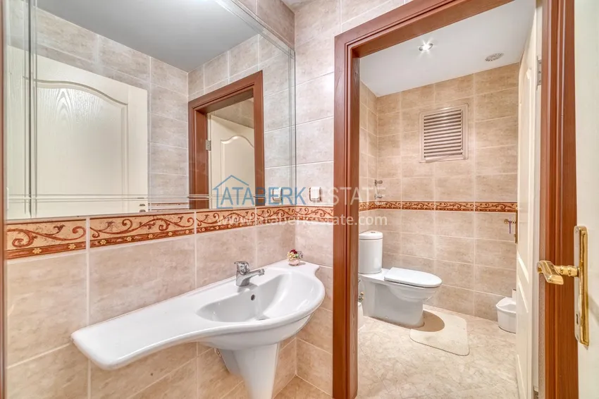 Purchase Linear 4+1 apartment with a modern interior in a complex on the beachfront in Alanya, Oba district 36 