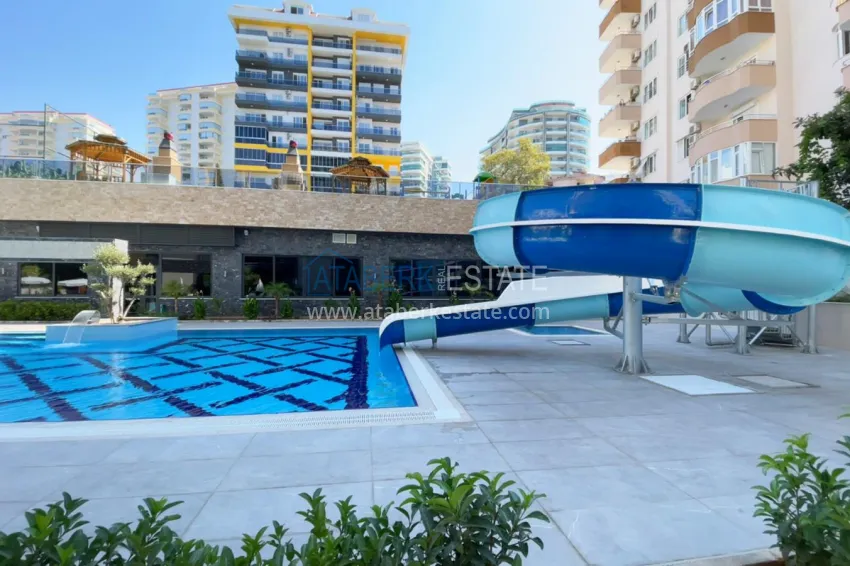 Linear 3+1 apartment with separate kitchen, new furniture and partial sea view - Mahmutlar district, Alanya 4