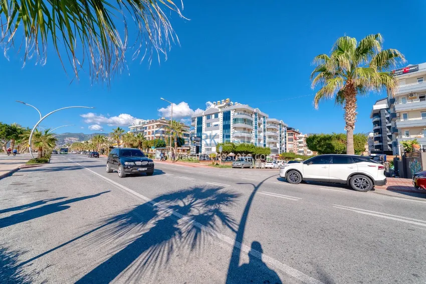 Linear 4+1 apartment with a modern interior in a complex on the beachfront in Alanya, Oba district 6 