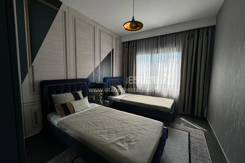 Purchase  2+1 apartment with furniture and sea view in a young complex, Mahmutlar district — Alanya 12 