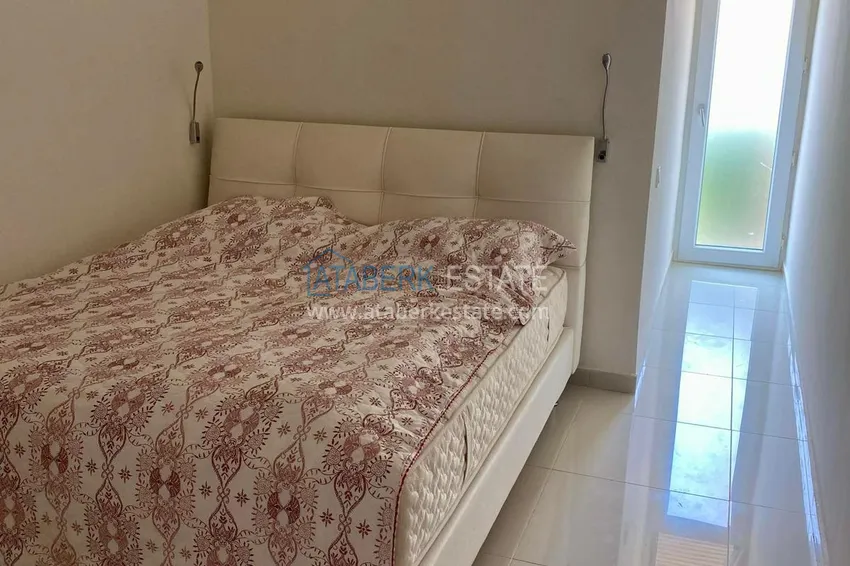 Purchase  Two-storey villa in Kargicak, furnished, with private garage and swimming pool  14 