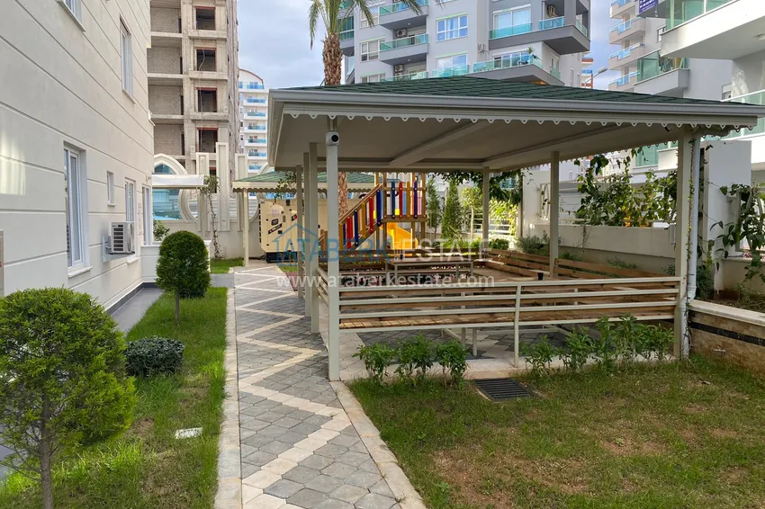 Furnished apartment in Mahmutlar with a glazed balcony in a premium complex 8