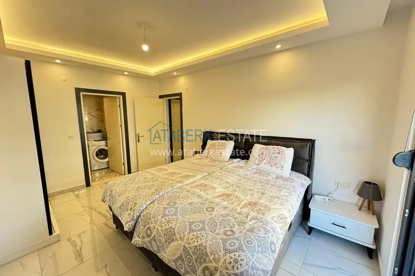 Purchase  Two-bedroom apartment in Mahmutlar with new furniture and mountain views 11 