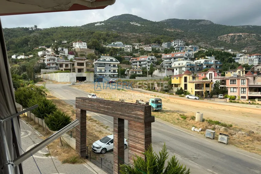 Purchase  Apartment in the center of Alanya with separate kitchen furniture and mountain views  11 