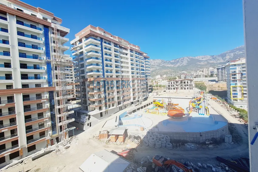 Purchase  Apartment 1+1 with furniture and mountain views in a complex with hotel infrastructure, Mahmutlar district — Alanya  12 