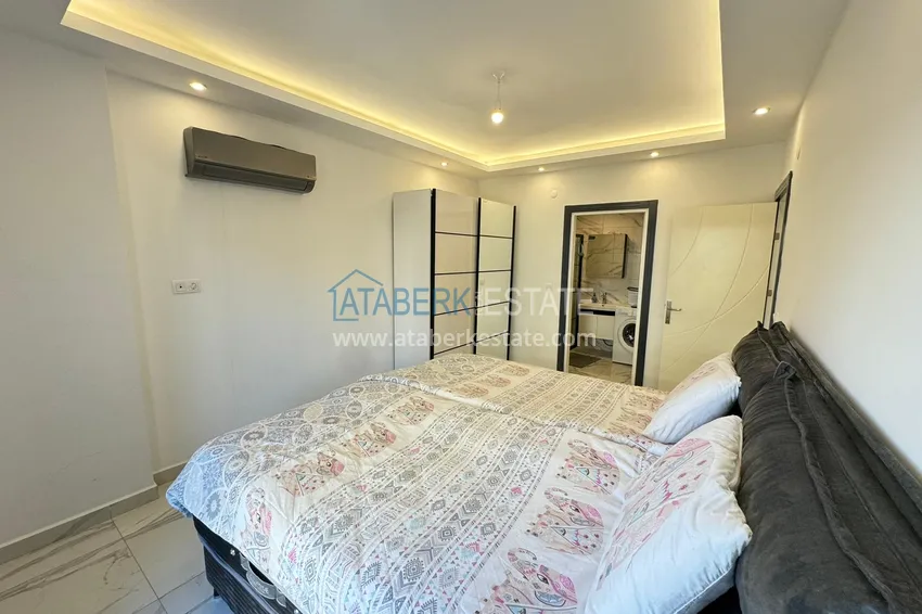 Purchase  Two-bedroom apartment in Mahmutlar with new furniture and mountain views 12 