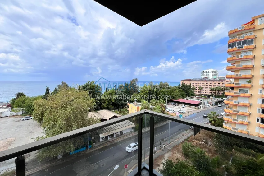 Purchase Furnished 1+1 apartment with sea view, Kargicak district — Alanya 12 