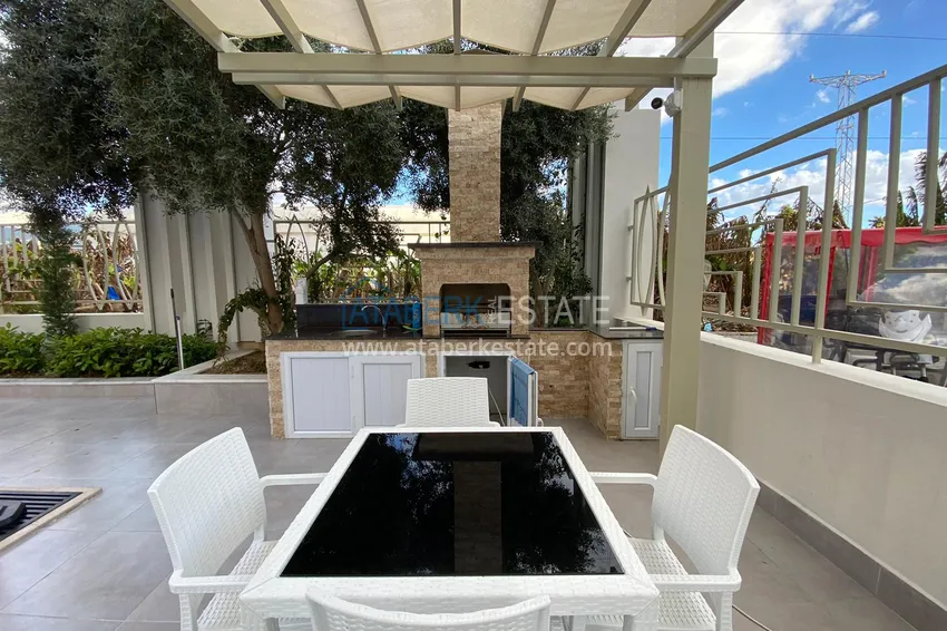 Furnished apartment in Mahmutlar with a glazed balcony in a premium complex 10