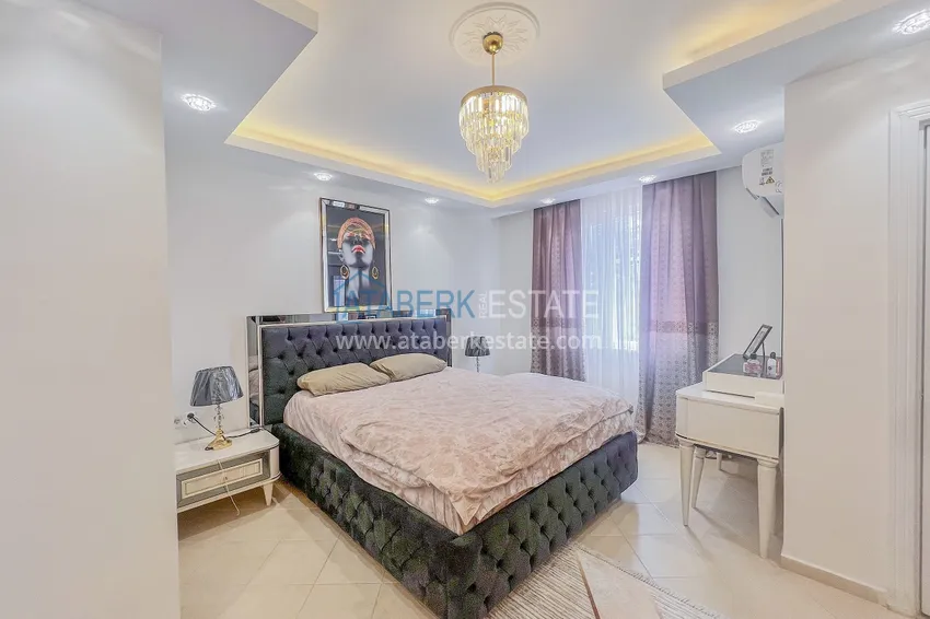 Purchase Two-bedroom apartment with new furniture and a glazed balcony in Mahmutlar 13 