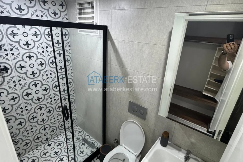 Purchase Two-bedroom apartment with furniture and a glazed balcony in Mersin - Tomyuk 16