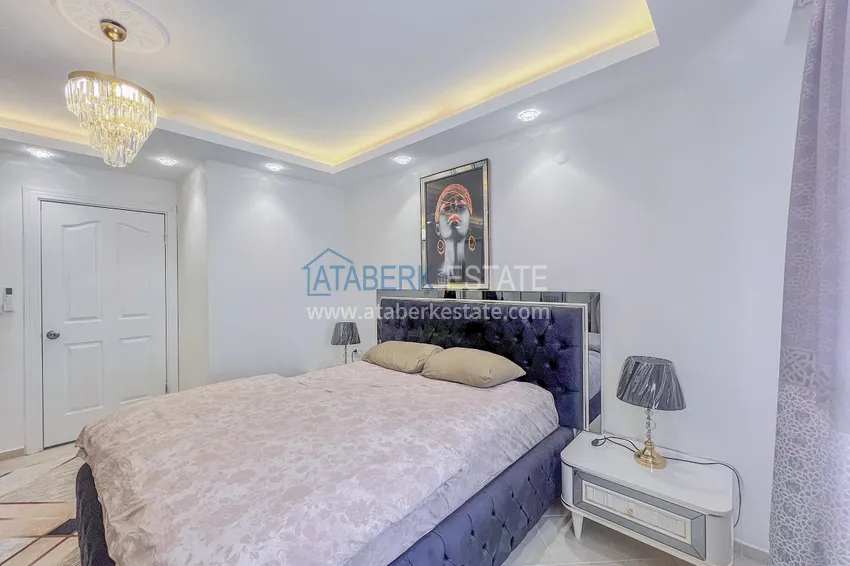 Purchase Two-bedroom apartment with new furniture and a glazed balcony in Mahmutlar 14 