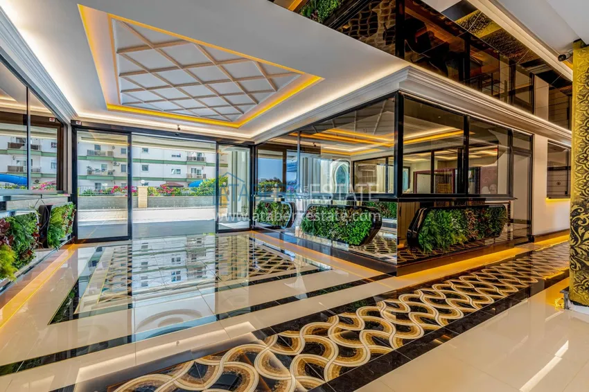 Furnished apartment in Mahmutlar with a glazed balcony in a premium complex 13