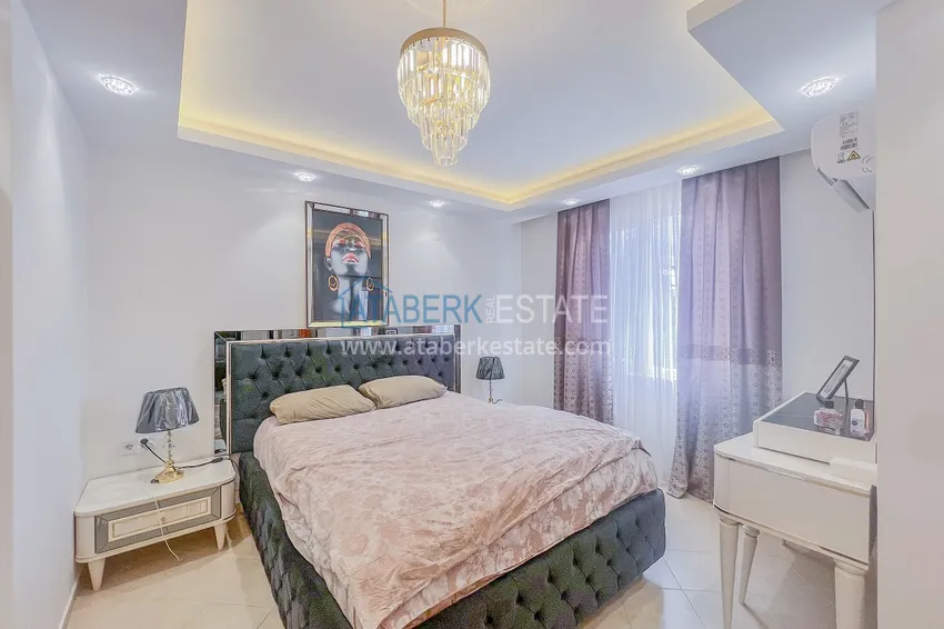 Purchase Two-bedroom apartment with new furniture and a glazed balcony in Mahmutlar 16 