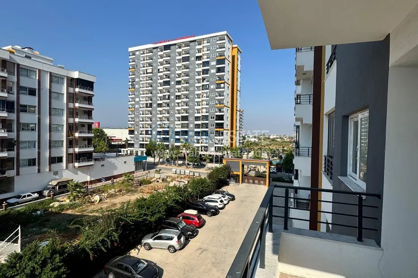 Purchase Two-bedroom apartment with furniture and a glazed balcony in Mersin - Tomyuk 21