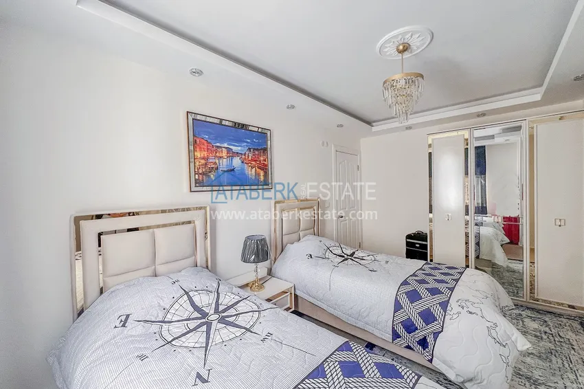 Purchase Two-bedroom apartment with new furniture and a glazed balcony in Mahmutlar 19 