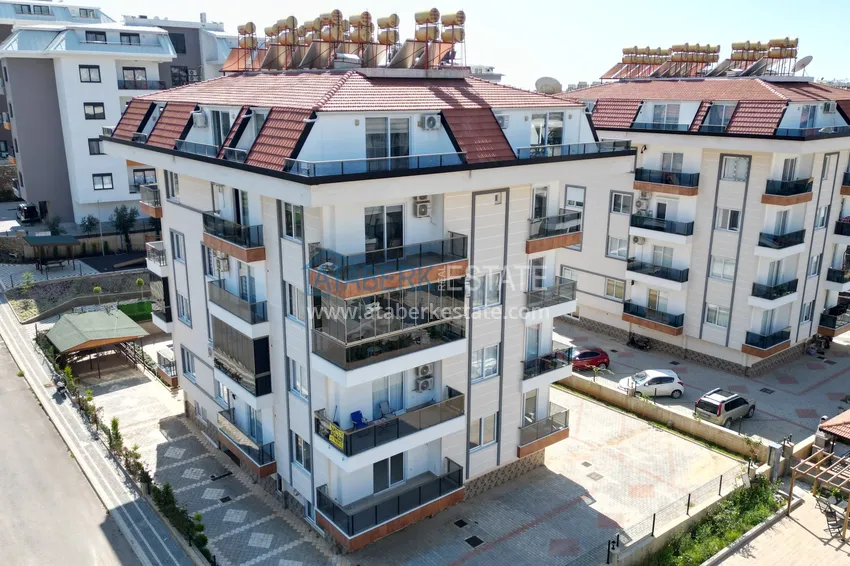Three-room apartment in Alanya, Oba district in a cozy urban complex 1 