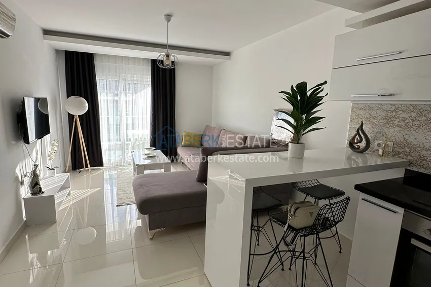 Purchase  1+1 furnished apartment with mountain views, Alanya center Cleopatra beach area 1 