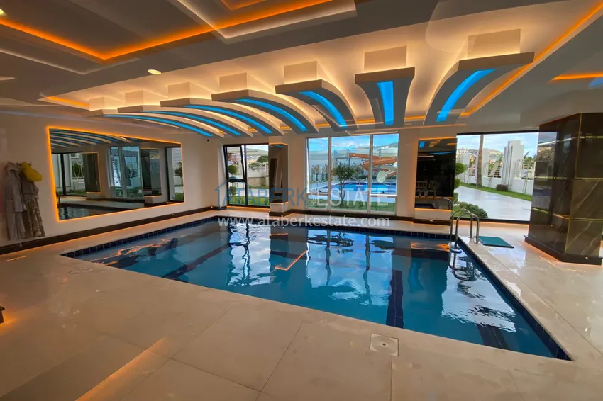 Furnished apartment in Mahmutlar with a glazed balcony in a premium complex 18