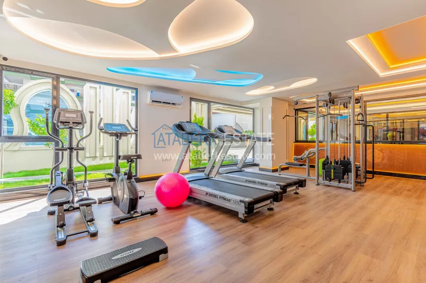 Furnished apartment in Mahmutlar with a glazed balcony in a premium complex 19